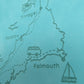 Detailed engraving on a turquoise Cornwall road trip journal showing Tintagel, Padstow, Falmouth and a miniature campervan.