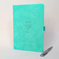 Personalised turquoise memorial journal with silver pen, engraved with Dad and the words All of the things I wish I could tell you.