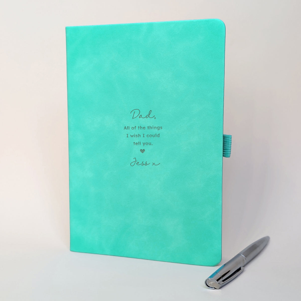 Personalised turquoise memorial journal with silver pen, engraved with Dad and the words All of the things I wish I could tell you.