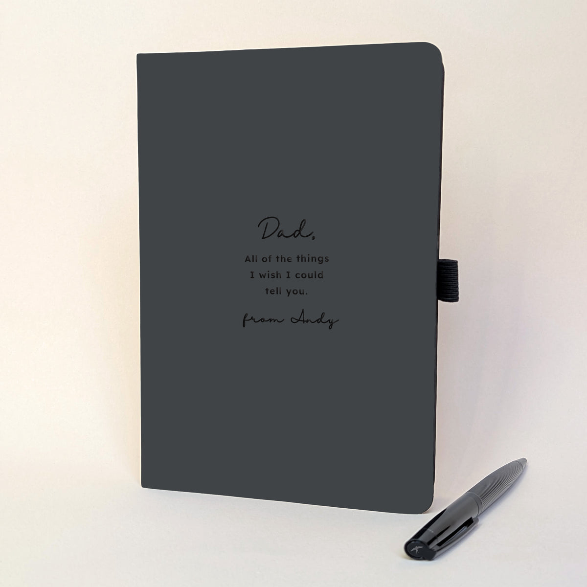 Personalised black keepsake journal with black pen, featuring Dad and All of the things I wish I could tell you in a handwritten font style.