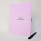 Pink personalised staff appreciation journal for Sophie reading “Master of Multitasking”, shown with a black pen.