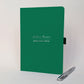 Green personalised A5 journal with Joshua Green and Sustainability Officer on the cover in silver, shown with a matching silver metal pen. Personalised name and job title notebook for work, a new role or colleague gift.