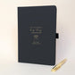 Personalised black wedding journal with gold lettering and matching gold pen, customised for Ben and Dan.